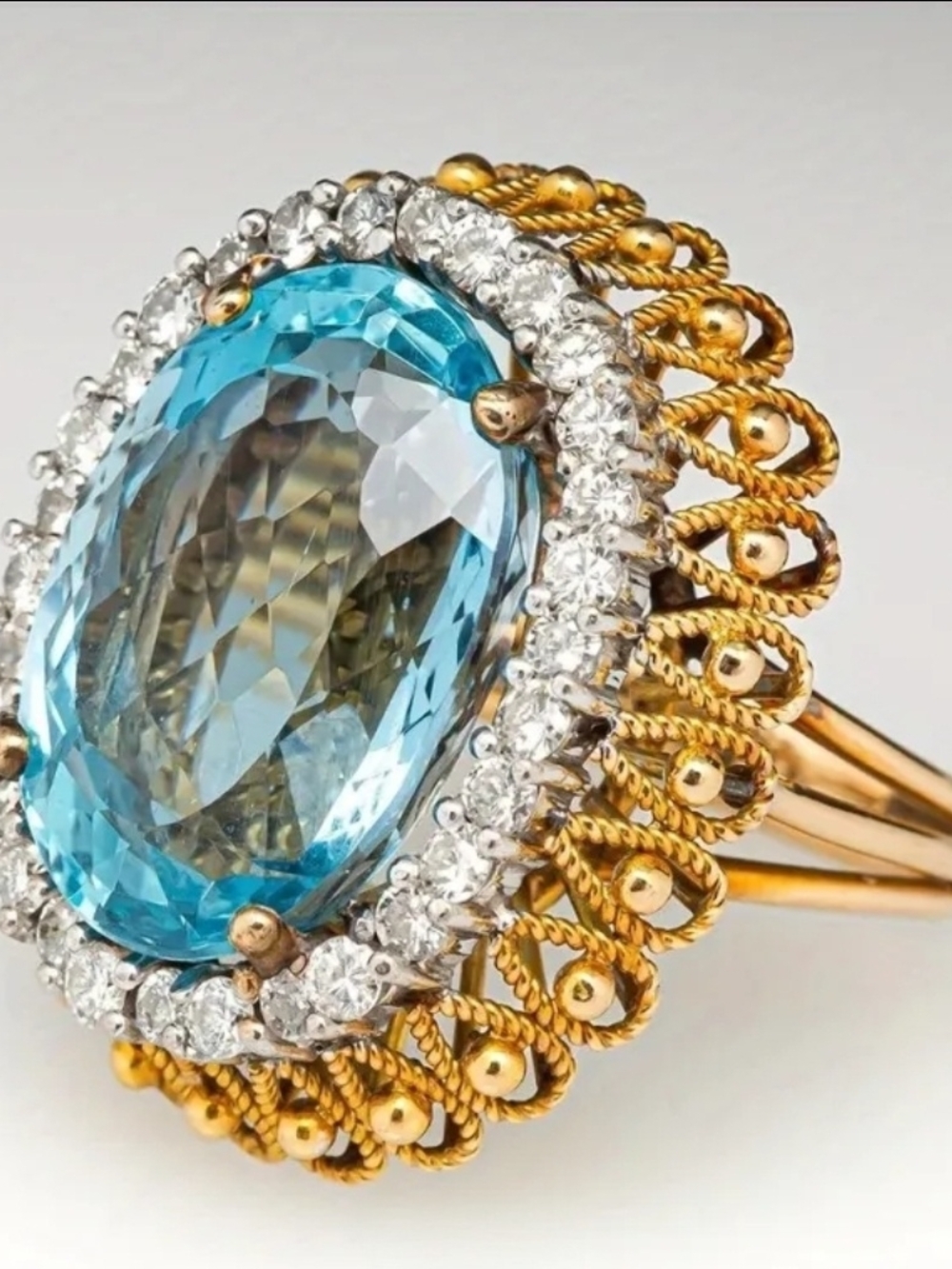 Gold-Tone Ring with Oval Blue Gem and Clear Halo Ring Size 7 - Picture 2 of 4